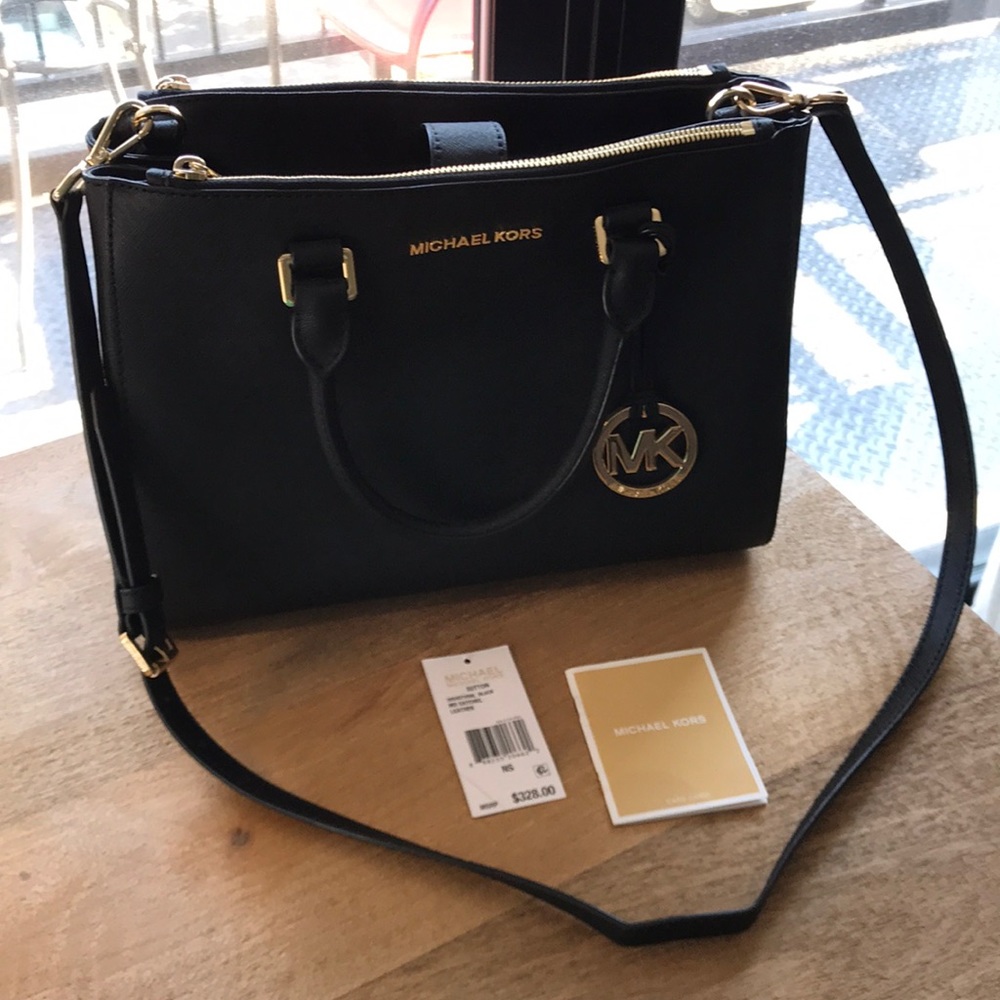 Michael Kors black structured bag/purse.
